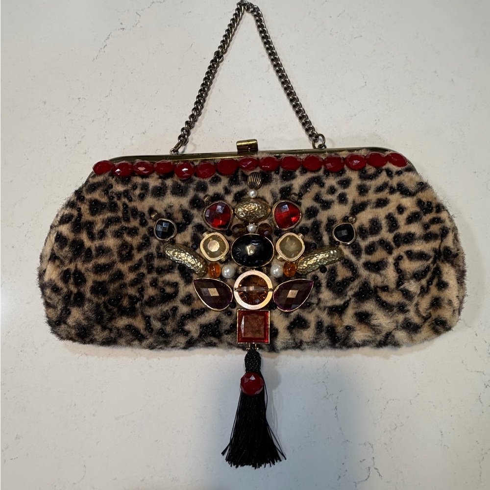 Elegant Leopard Print Clutch with Red and Gold Embellishments